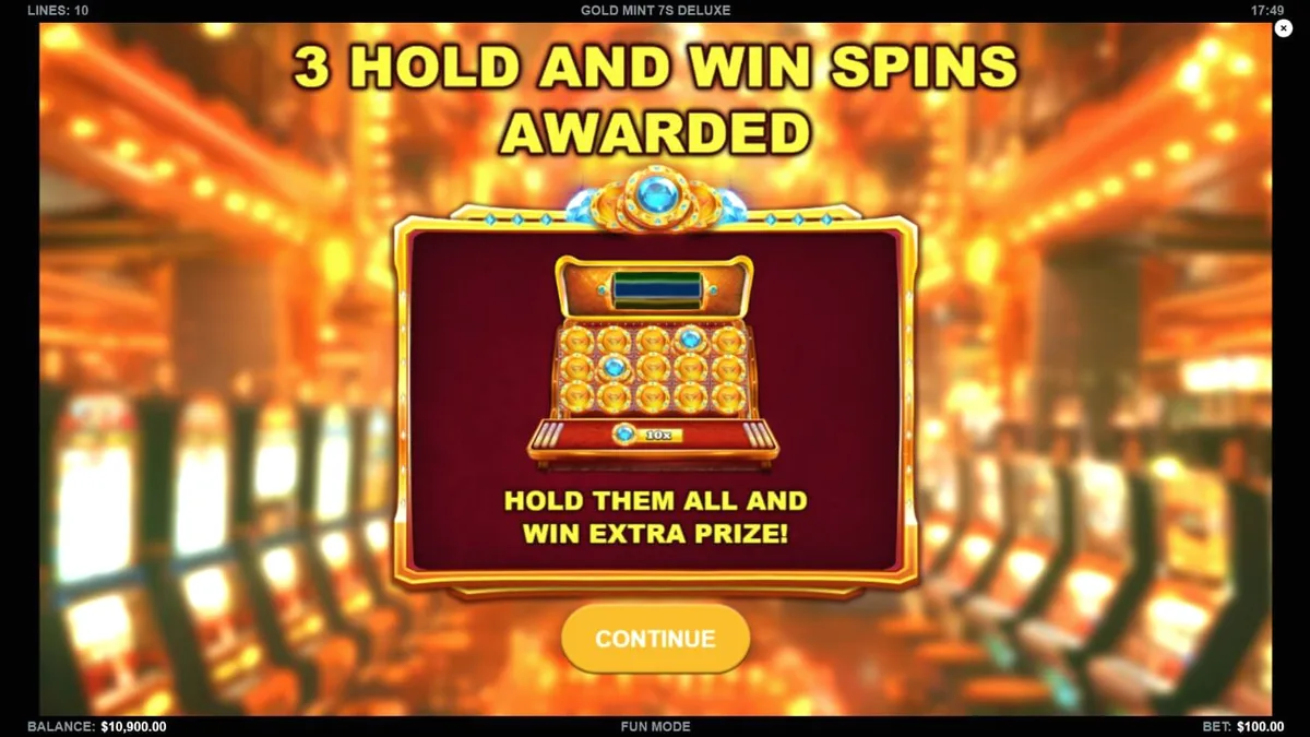 Gold Mint 7s Deluxe slot machine interface with gold and jewel symbols